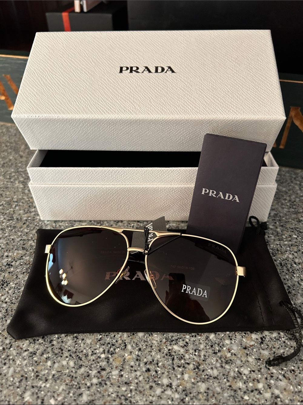 Prada Unisex Gold Frame Brown Lens Aviator Sunglasses